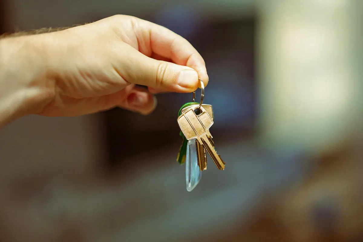 Handing over a bunch of house keys